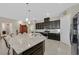 Bright kitchen with a large center island, ample cabinetry, and modern appliances at 444 Middlestone Ave, Henderson, NV 89011