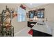 Stylish wet bar with granite countertops, dark cabinetry, and a wine rack at 444 Middlestone Ave, Henderson, NV 89011