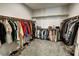 Spacious walk in closet featuring clothes rack and carpet floors at 4717 S Maddington Ct, Pahrump, NV 89061