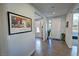 Tiled entryway with view into other rooms, art and front door at 4717 S Maddington Ct, Pahrump, NV 89061