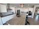 Bright kitchen featuring stainless appliances, granite counters, and a large island with seating at 4717 S Maddington Ct, Pahrump, NV 89061