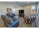 Comfortable living room with tile flooring and stylish seating arrangements at 4717 S Maddington Ct, Pahrump, NV 89061