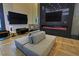 Modern lounge area with comfortable seating, fireplace, and sleek design elements at 4717 S Maddington Ct, Pahrump, NV 89061