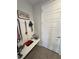 Mud room featuring a bench, hooks and a view to a white door at 4717 S Maddington Ct, Pahrump, NV 89061
