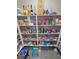 Fully stocked kitchen pantry with shelving containing various food items, and storage at 4717 S Maddington Ct, Pahrump, NV 89061