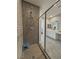 Shower with gray walls and decorative pattern tile and chrome shower fixture at 4717 S Maddington Ct, Pahrump, NV 89061