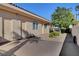 Backyard concrete slab with access to a pair of closet doors at 4936 Mountain Foliage Dr, Las Vegas, NV 89148