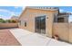 Enclosed backyard featuring an extended patio area with room for outdoor seating and entertaining at 5031 Droubay Dr, Las Vegas, NV 89122