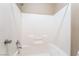Clean, bright bathroom boasts a tiled shower with a built-in shelf and modern fixtures at 5031 Droubay Dr, Las Vegas, NV 89122
