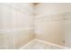 Walk-in closet with tile floor and multiple rows of sturdy wire shelving at 5031 Droubay Dr, Las Vegas, NV 89122