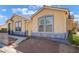 Beautiful single-story home with a stone-accented facade and low-maintenance landscaping at 5031 Droubay Dr, Las Vegas, NV 89122