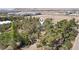 Overhead shot showcases the property nestled among mature trees providing lots of privacy at 55 Siddall Ave, Las Vegas, NV 89183