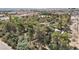 Aerial view of a property surrounded by lush trees and landscaping at 55 Siddall Ave, Las Vegas, NV 89183