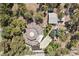 Aerial view of an estate featuring unique architecture, a pool, several structures, and mature landscaping at 55 Siddall Ave, Las Vegas, NV 89183