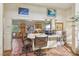 A cheerful breakfast nook features built-in seating, plenty of storage and lots of sunlight at 55 Siddall Ave, Las Vegas, NV 89183