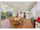 The dining room flows to the indoor garden and many other parts of the house for easy access at 55 Siddall Ave, Las Vegas, NV 89183