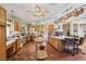 Spacious kitchen with wood cabinets, a center island, and unique tile floors at 55 Siddall Ave, Las Vegas, NV 89183