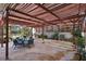 Covered patio with ample seating, perfect for outdoor gatherings and enjoying the shade at 55 Siddall Ave, Las Vegas, NV 89183