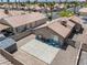 Aerial view of the backyard with a patio and desert landscaping at 5550 Ramirez St, North Las Vegas, NV 89031