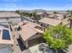Aerial view of a single-Gathering home with a tile roof and desert landscaping at 5550 Ramirez St, North Las Vegas, NV 89031
