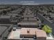 Aerial view of neighborhood featuring the Las Vegas Strip, with desert landscaping at 5550 Ramirez St, North Las Vegas, NV 89031
