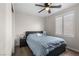 Comfortable bedroom featuring ceiling fan and stylish decor at 5550 Ramirez St, North Las Vegas, NV 89031