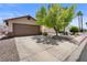 Charming single-story home with a well-maintained front yard and a two-car garage at 5550 Ramirez St, North Las Vegas, NV 89031