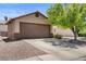 Attractive single-story home with a two-car garage and mature landscaping at 5550 Ramirez St, North Las Vegas, NV 89031