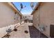Side yard with desert landscaping and utilities at 5550 Ramirez St, North Las Vegas, NV 89031