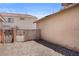 Gravel side yard with access gate at 5550 Ramirez St, North Las Vegas, NV 89031
