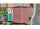 Great aerial view of the home and backyard showcasing pool, patio, landscaping, and layout at 5788 Robin Ridge Ave, Las Vegas, NV 89141