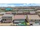 Scenic aerial view of the backyard featuring a pristine pool and patio surrounded by greenery at 5788 Robin Ridge Ave, Las Vegas, NV 89141
