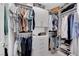 Walk-in closet with hanging racks, drawers, and shelving for organized storage at 5788 Robin Ridge Ave, Las Vegas, NV 89141
