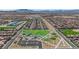 Aerial view showcases a well-designed community park with play areas, seating and open green spaces at 5788 Robin Ridge Ave, Las Vegas, NV 89141