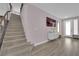 Inviting entryway featuring a staircase, stylish decor, and plenty of natural light at 5788 Robin Ridge Ave, Las Vegas, NV 89141