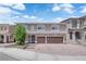 Beautiful two-story home featuring a three-car garage and well-maintained front yard at 5788 Robin Ridge Ave, Las Vegas, NV 89141