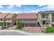 Charming two-story home with a well-manicured lawn and brick driveway at 5788 Robin Ridge Ave, Las Vegas, NV 89141