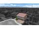A two-story home with a three-car garage and manicured landscaping, nestled in a Gathering-friendly neighborhood at 5788 Robin Ridge Ave, Las Vegas, NV 89141