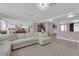 Bright and airy living room featuring a large sectional sofa and open floor plan at 5788 Robin Ridge Ave, Las Vegas, NV 89141