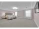 Large main bedroom with carpeted floors, tray ceiling, and window at 5788 Robin Ridge Ave, Las Vegas, NV 89141
