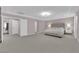 Spacious main bedroom featuring a tray ceiling, and a large window at 5788 Robin Ridge Ave, Las Vegas, NV 89141