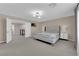 Bright main bedroom with neutral walls and decor and carpeted floors at 5788 Robin Ridge Ave, Las Vegas, NV 89141