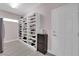 Well-organized mudroom with built-in shoe storage and access to the garage or laundry area at 5788 Robin Ridge Ave, Las Vegas, NV 89141