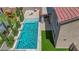 Aerial view of a private pool with turquoise water and landscaped backyard, including a play structure at 5788 Robin Ridge Ave, Las Vegas, NV 89141