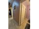 Hallway with tan tile flooring leads to other rooms at 6009 Arbor Crest St, North Las Vegas, NV 89081