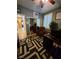 Well-lit office with chair and desk at 6009 Arbor Crest St, North Las Vegas, NV 89081