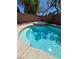 Beautiful pool featuring a built-in hot tub and plenty of room for activities at 6009 Arbor Crest St, North Las Vegas, NV 89081