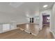 Open bonus room featuring hardwood floors and lots of natural light at 638 Ribbon Grass Ave, Las Vegas, NV 89183