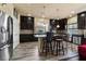 Modern kitchen with granite countertops and stainless steel appliances at 6705 Philharmonic Ave, Las Vegas, NV 89139