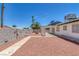 Backyard featuring low maintenance landscaping and a firepit at 6808 Waterhen Cir, Las Vegas, NV 89108